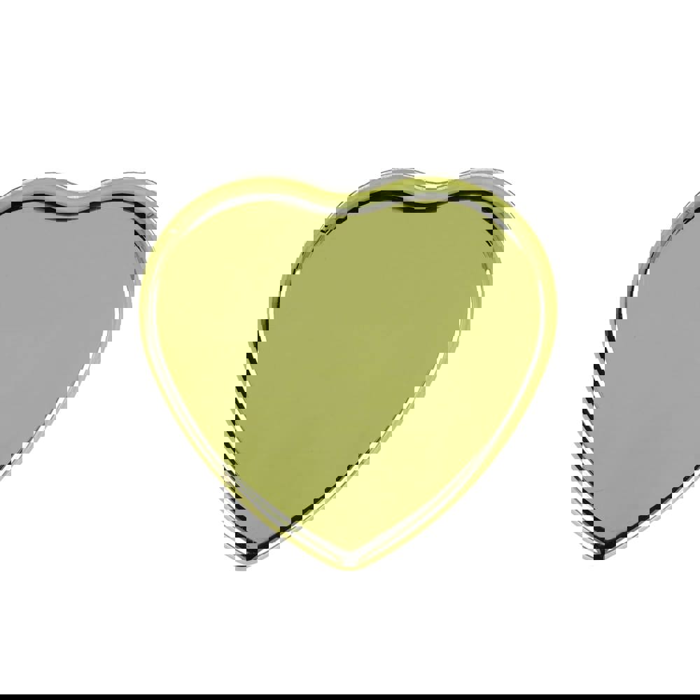 Lippenbalsam  in Flacher metallischer Herzformdose