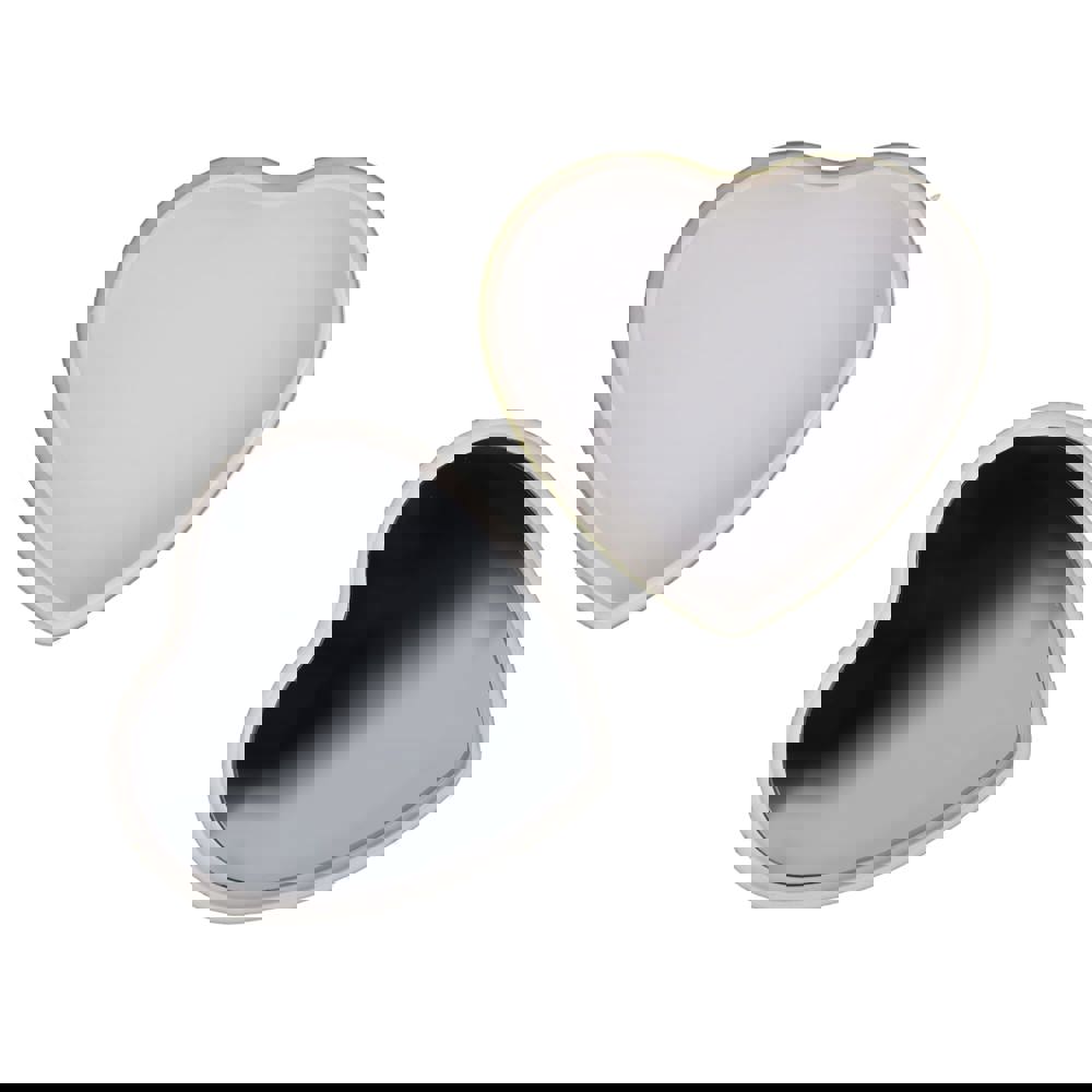 Lippenbalsam  in Flacher metallischer Herzformdose